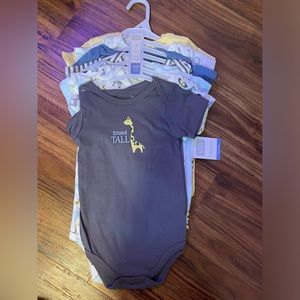 7 bodysuits, short sleeved - size 24M new with tags